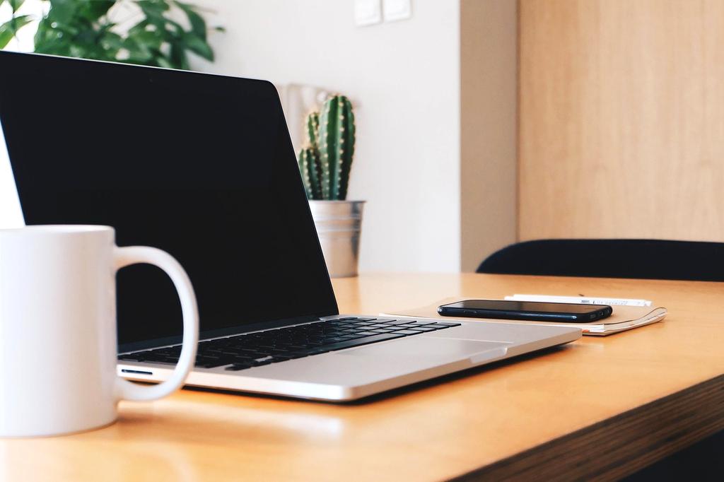 Modern tech workspace with multiple monitors